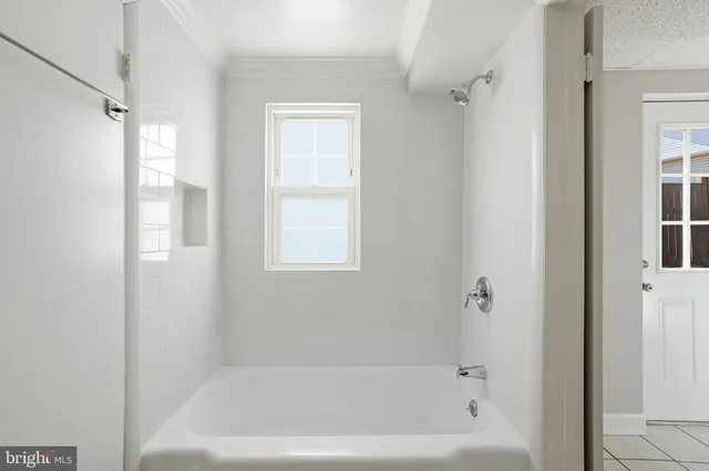 a bathroom with a bathtub