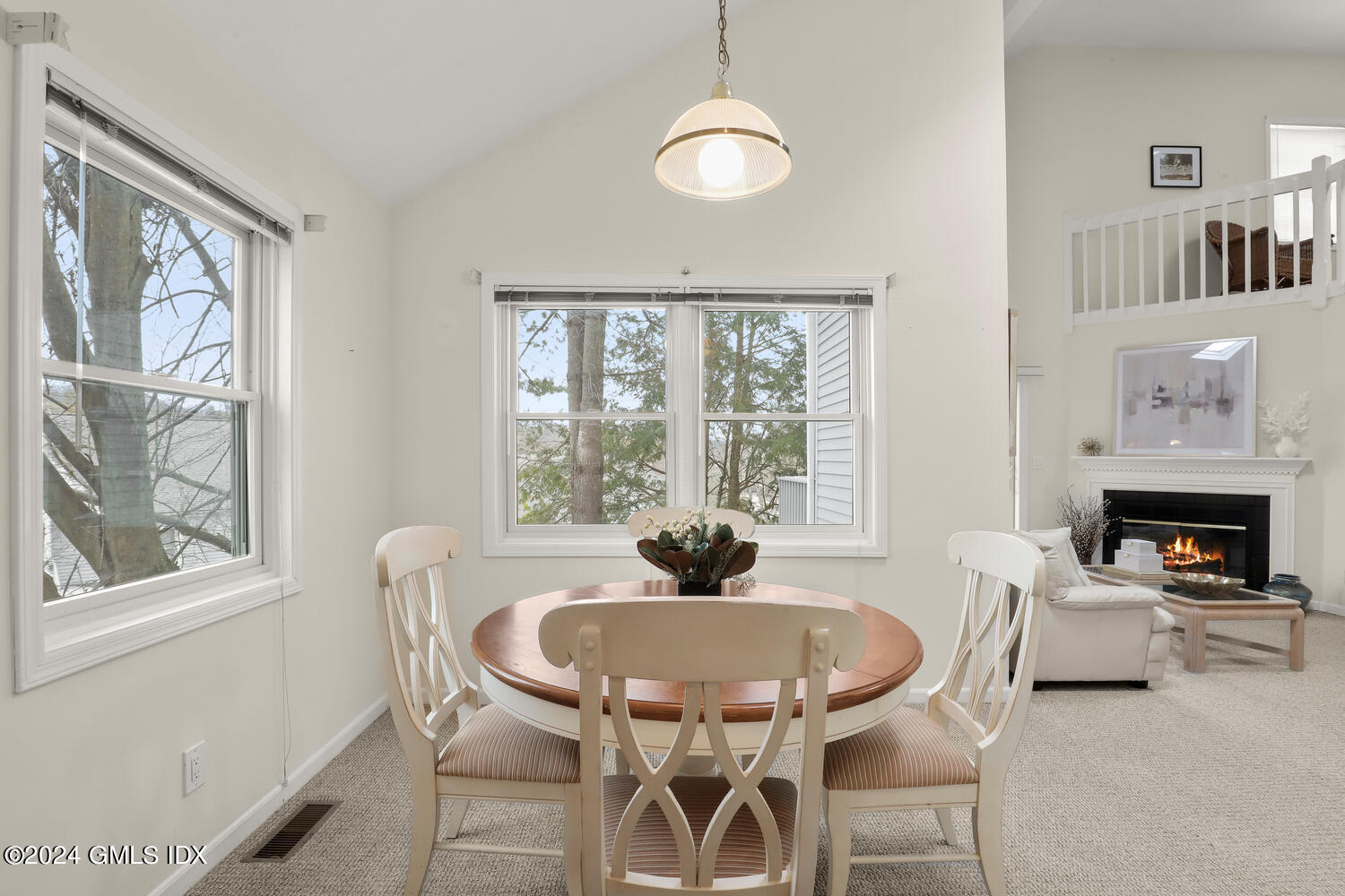 351 Pemberwick Road, Unit 915 Greenwich, CT 06831 - Photo 6 of 19 a view of a dining room with furniture window and outside view