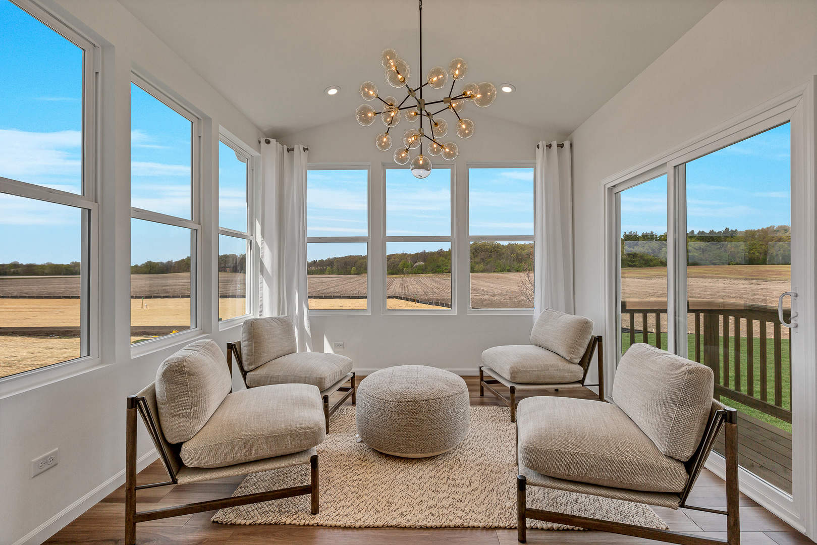 1702 Eastfield Drive Bartlett, IL 60103 - Photo 14 of 29 a living room with furniture and a large window