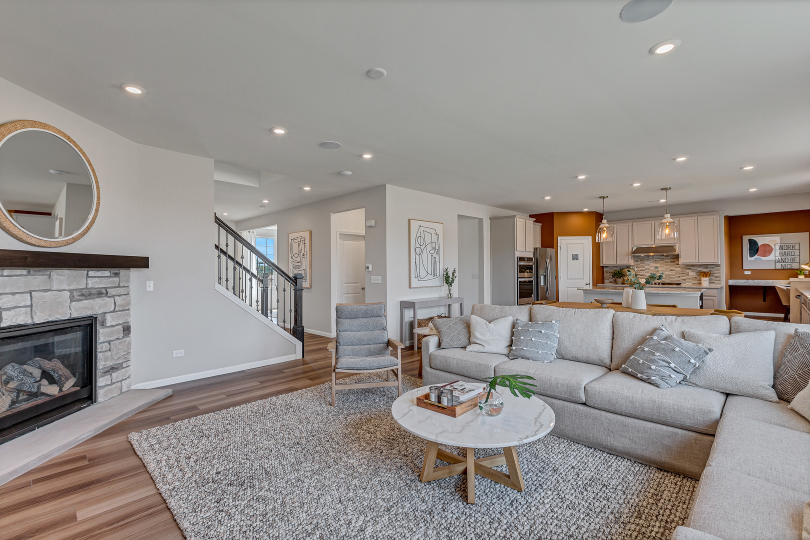 1702 Eastfield Drive Bartlett, IL 60103 - Photo 7 of 29 a living room with furniture and a fireplace