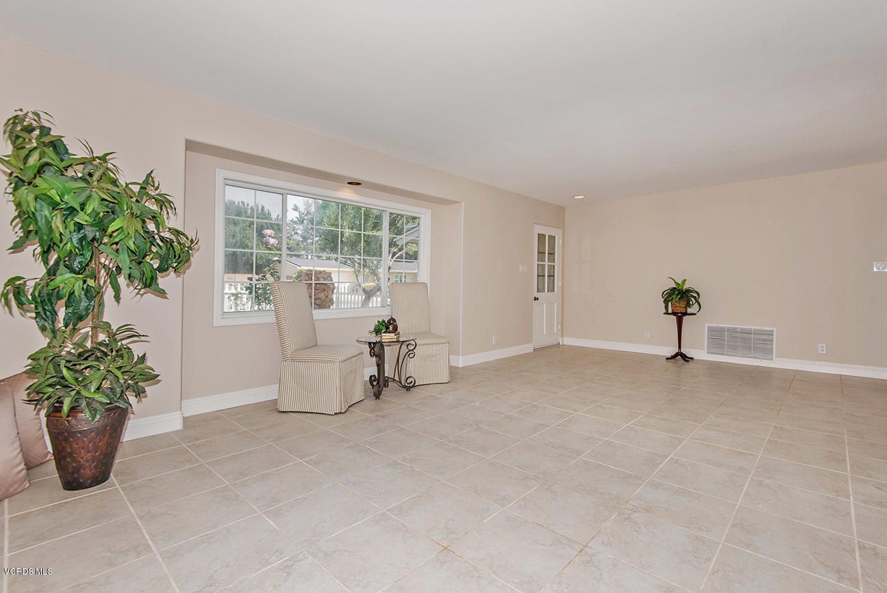 4204 Apricot Road Simi Valley, CA 93063 - Photo 4 of 20 a view of a livingroom with furniture and a potted plant