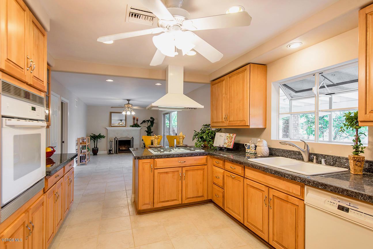 4204 Apricot Road Simi Valley, CA 93063 - Photo 5 of 20 a large kitchen with cabinets a sink and a stove
