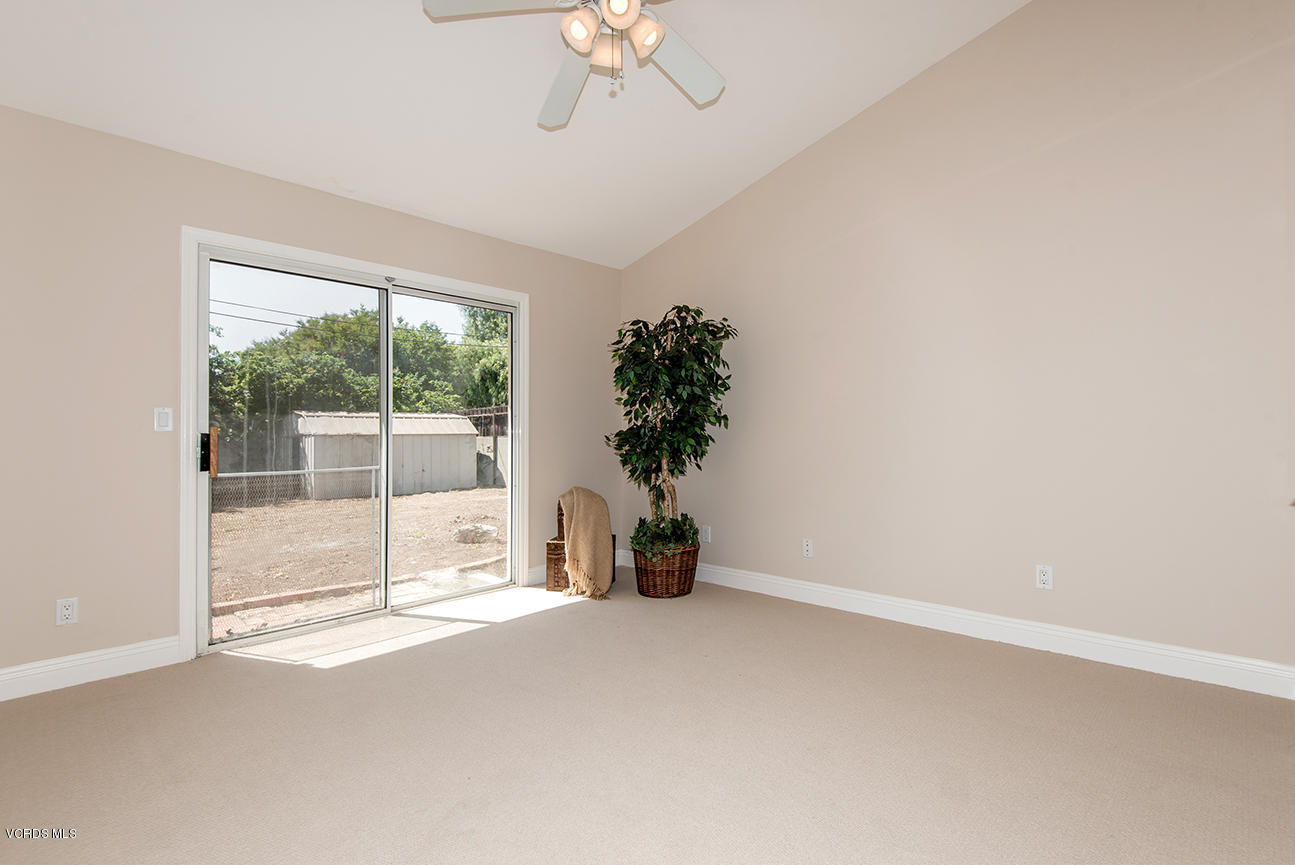 4204 Apricot Road Simi Valley, CA 93063 - Photo 9 of 20 a view of a room with wooden floor and a ceiling fan