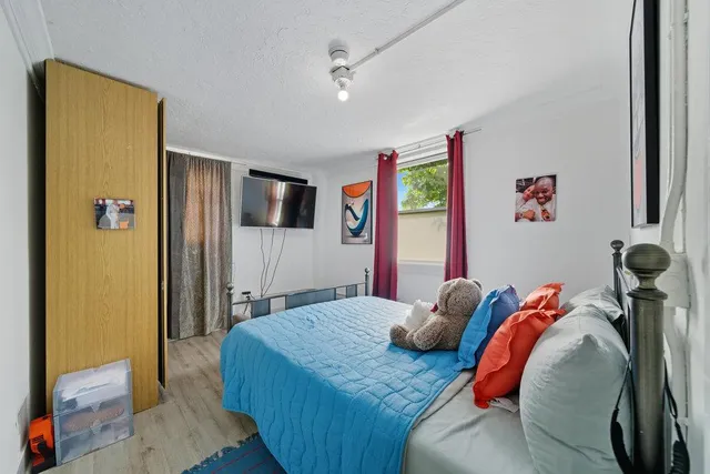 a view of balcony with a potted plant