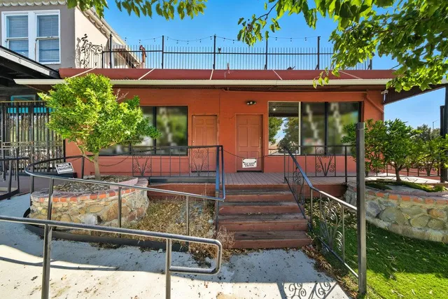 a bedroom with a bed and a cabinets