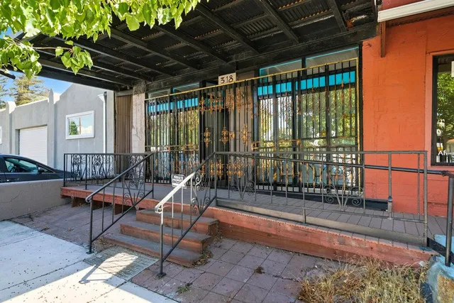a bathroom with a sink mirror and toilet