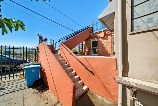 a view of a livingroom with furniture and empty room