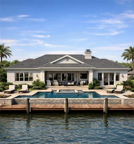 a view of a house with swimming pool and sitting area