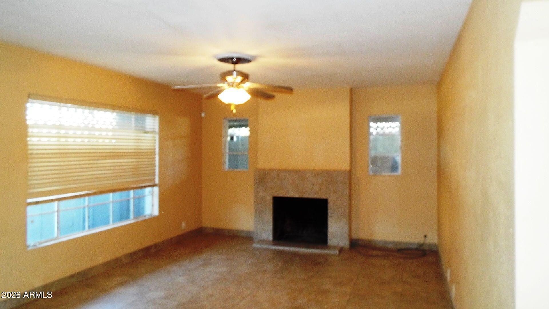 4331 North 20th Street Phoenix, AZ 85016 - Photo 7 of 13 a view of empty room with a fireplace