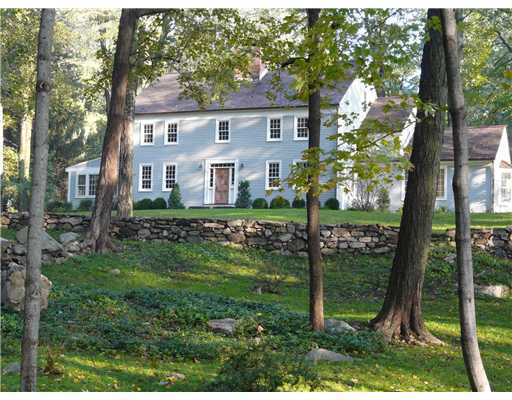 362 Mill Road Stamford, CT 06903 - Photo 1 of 20 a front view of a house with a yard