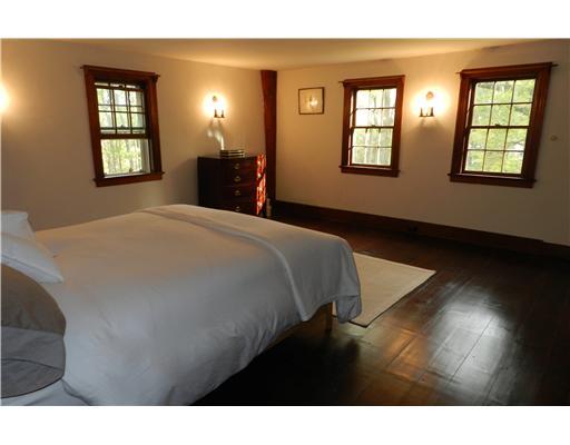 362 Mill Road Stamford, CT 06903 - Photo 14 of 20 a bedroom with a bed and a window