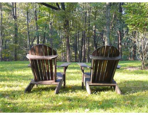 362 Mill Road Stamford, CT 06903 - Photo 20 of 20 a backyard of a house with table and chairs