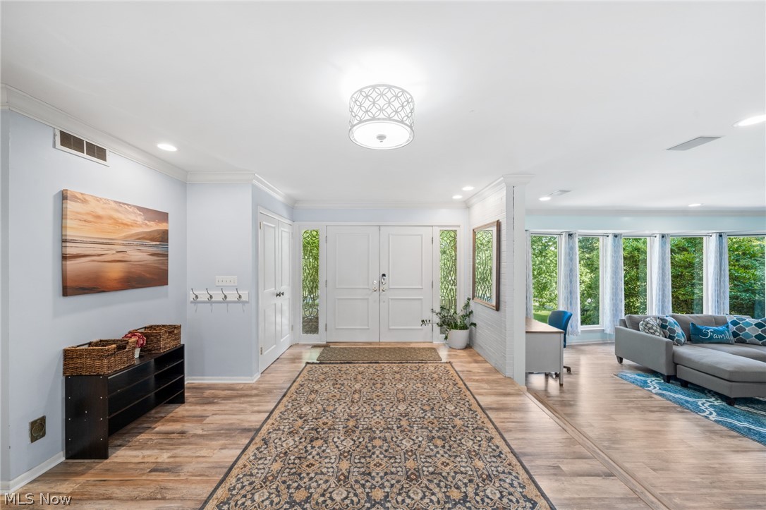 3930 Cardinal Road Akron, OH 44333 - Photo 2 of 34 Beautiful, welcoming foyer that opens to the living, dining, and family room.