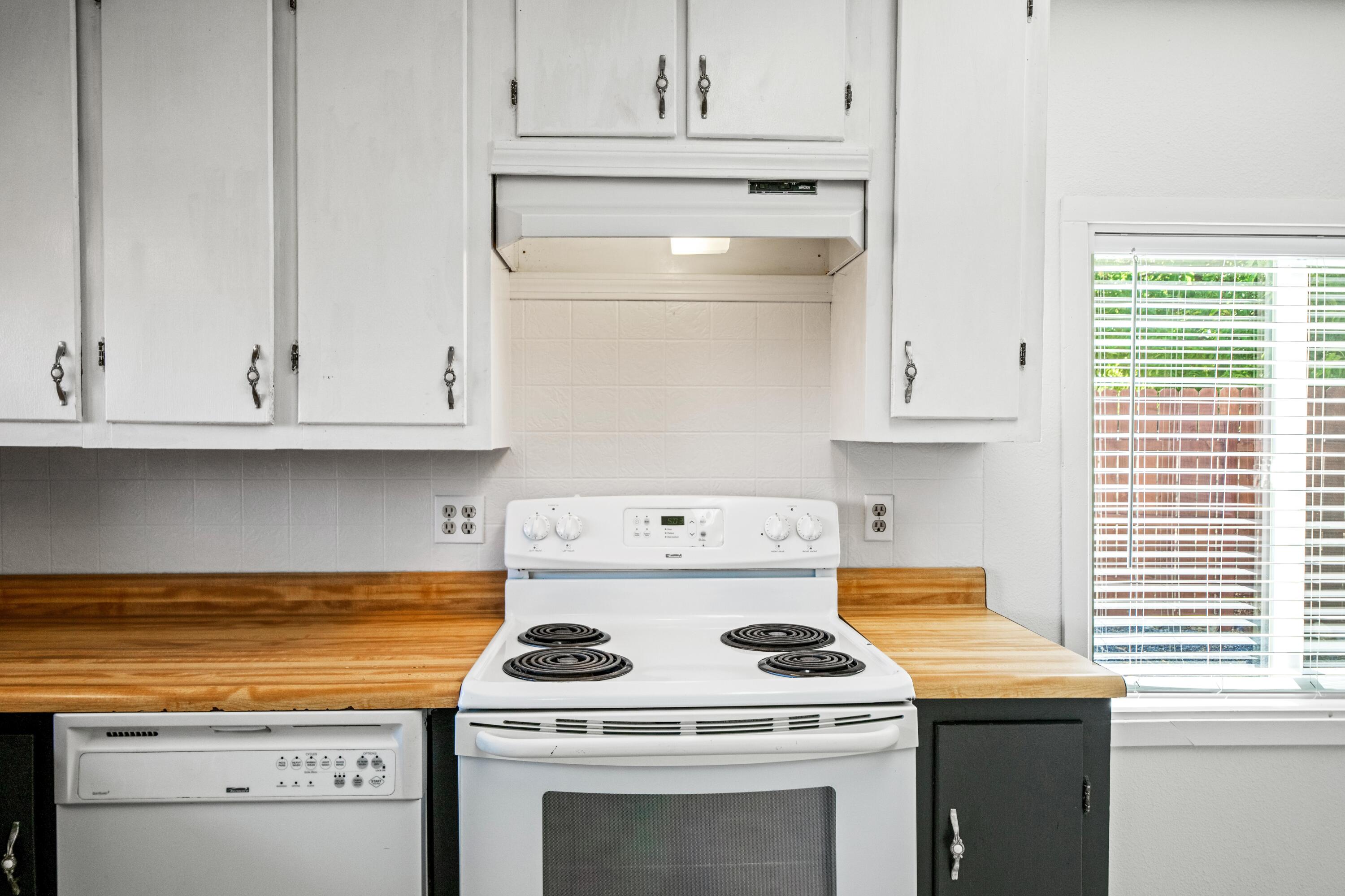 19825 Gas Point Road Cottonwood, CA 96022 - Photo 12 of 54 a stove top oven sitting inside of a kitchen