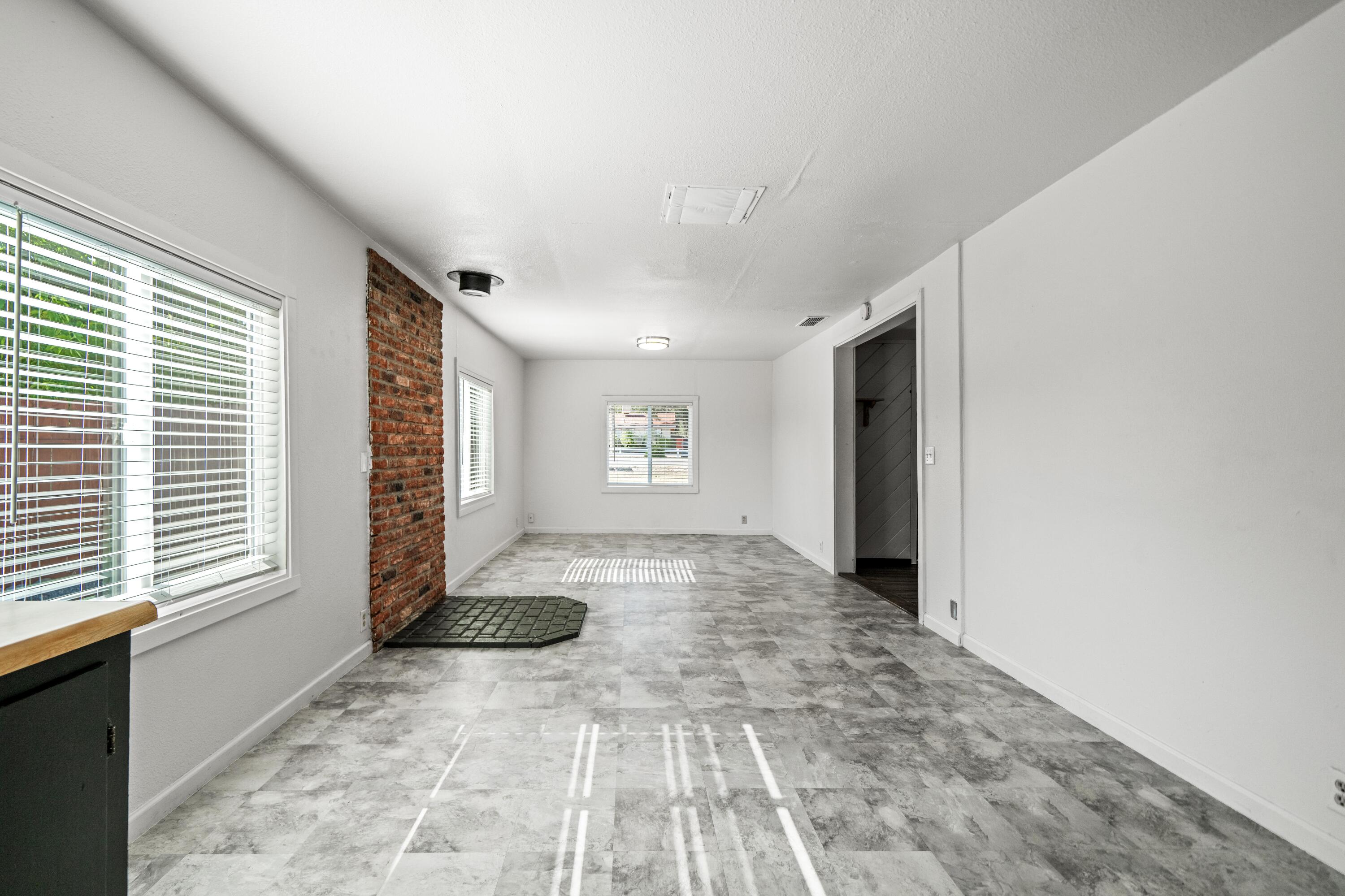 19825 Gas Point Road Cottonwood, CA 96022 - Photo 13 of 54 a view of a hallway with windows