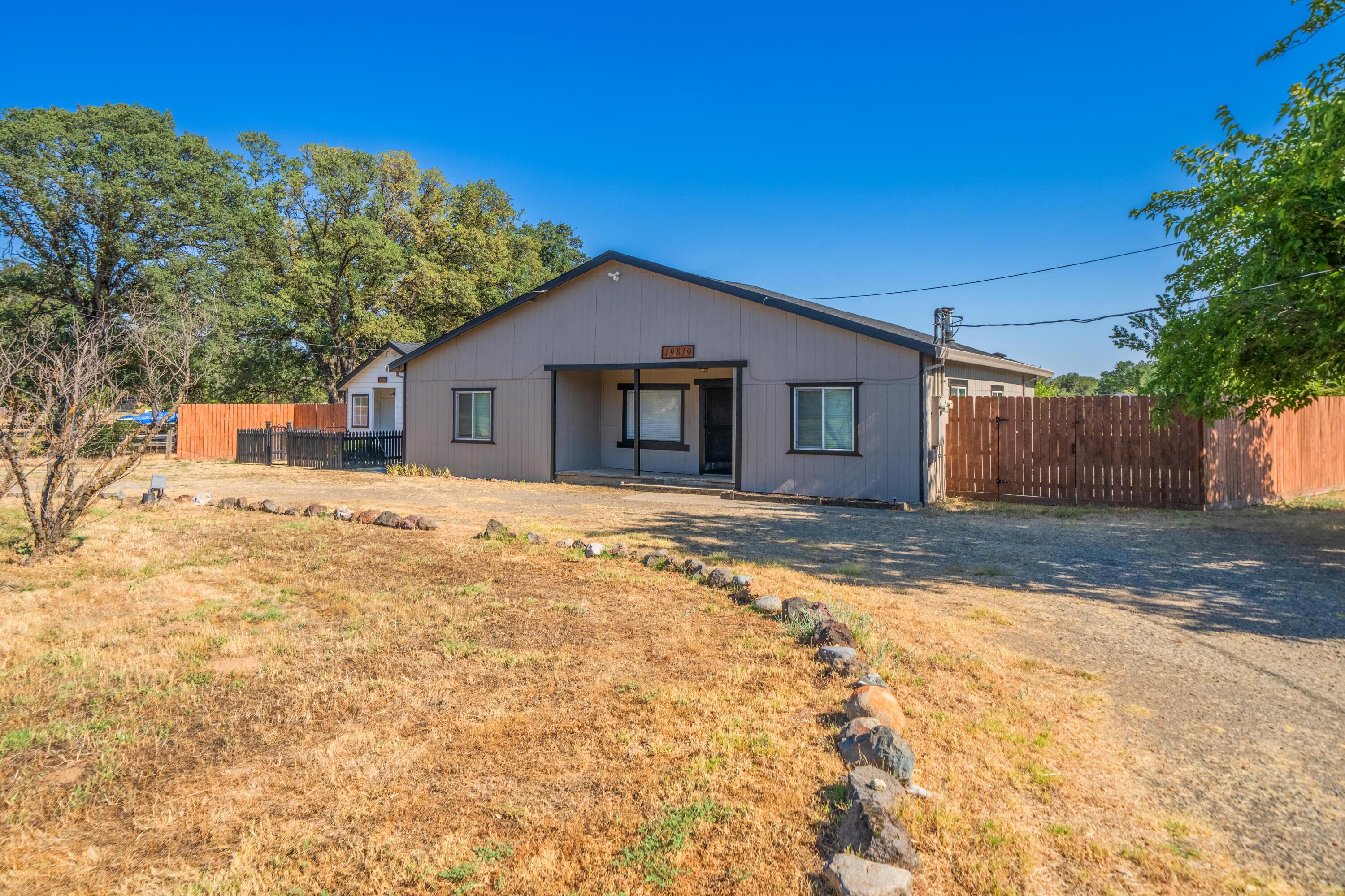 19825 Gas Point Road Cottonwood, CA 96022 - Photo 2 of 54 a house with a outdoor space