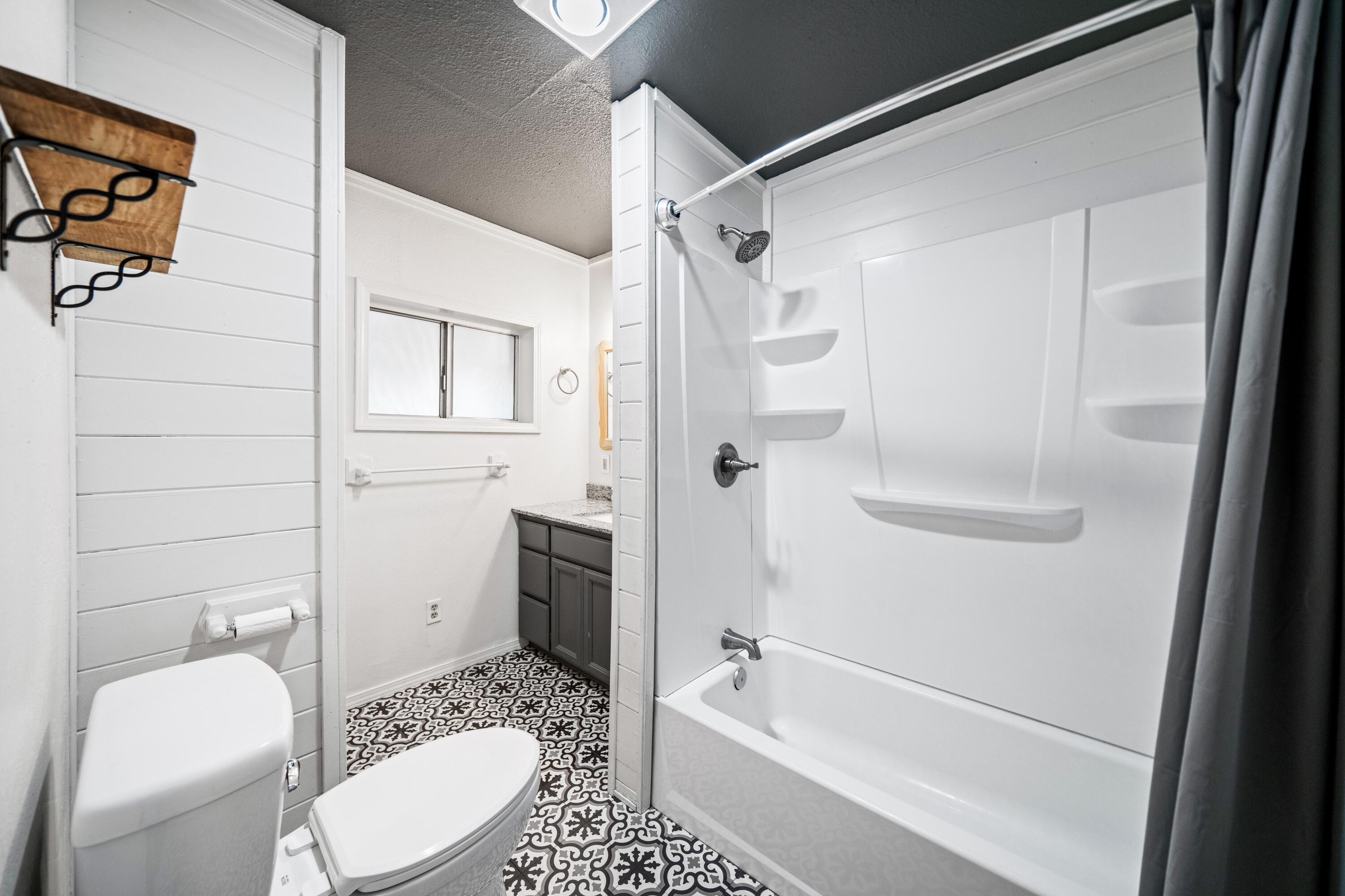 19825 Gas Point Road Cottonwood, CA 96022 - Photo 22 of 54 a bathroom with a sink a toilet and shower