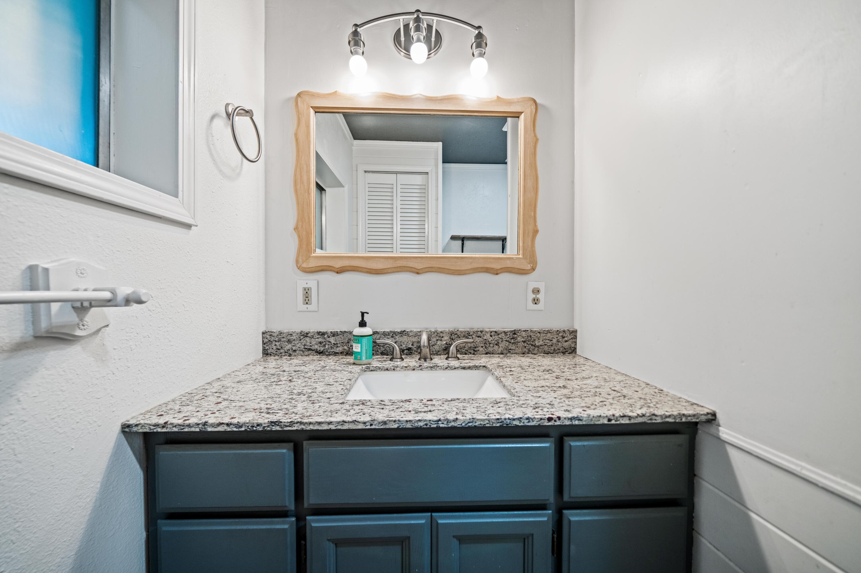 19825 Gas Point Road Cottonwood, CA 96022 - Photo 23 of 54 a bathroom with a sink and a mirror