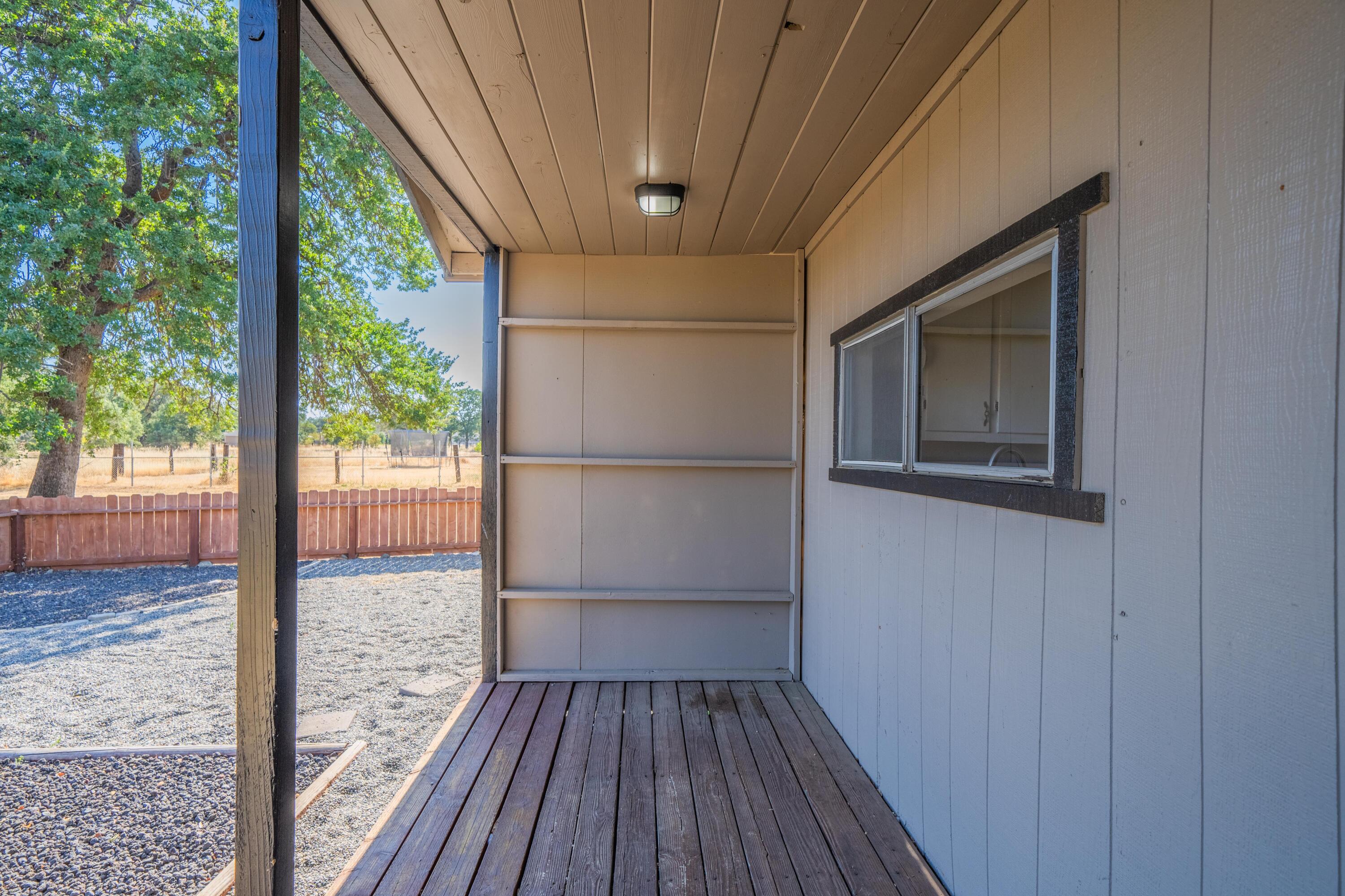 19825 Gas Point Road Cottonwood, CA 96022 - Photo 27 of 54 a view of a porch in the house