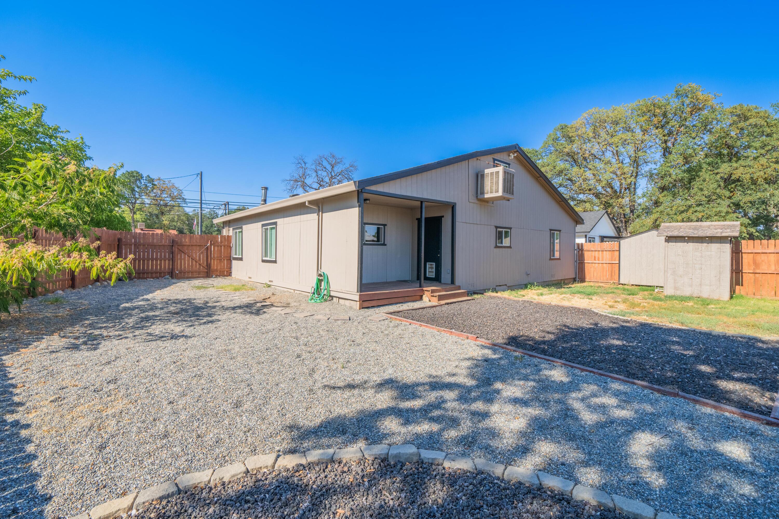 19825 Gas Point Road Cottonwood, CA 96022 - Photo 29 of 54 a view of a house with a yard