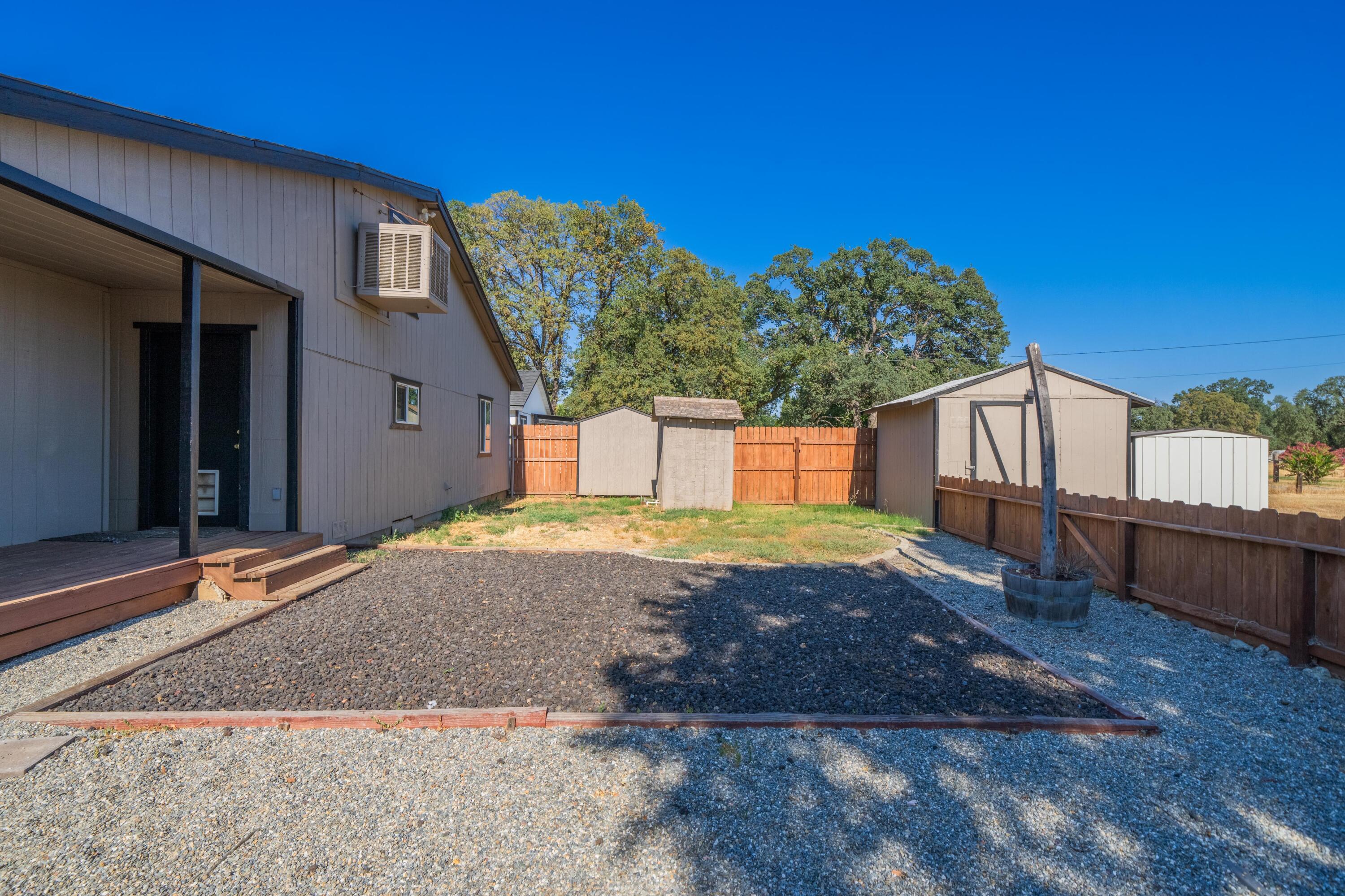 19825 Gas Point Road Cottonwood, CA 96022 - Photo 30 of 54 a view of a house with a yard