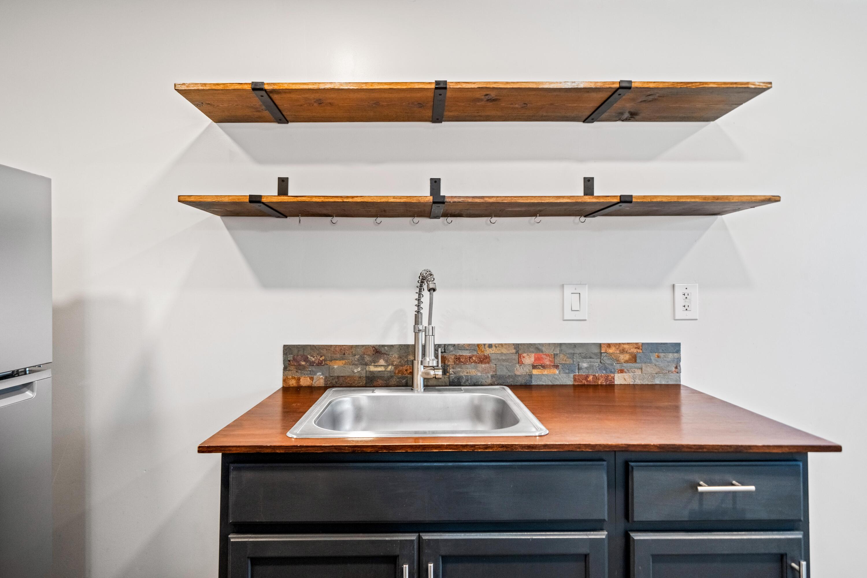 19825 Gas Point Road Cottonwood, CA 96022 - Photo 38 of 54 a sink with an umbrella