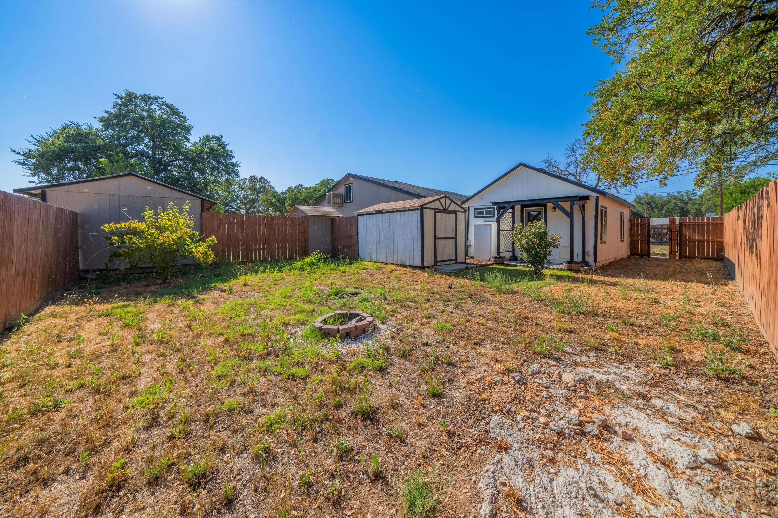 19825 Gas Point Road Cottonwood, CA 96022 - Photo 52 of 54 a front view of a house with yard and trees
