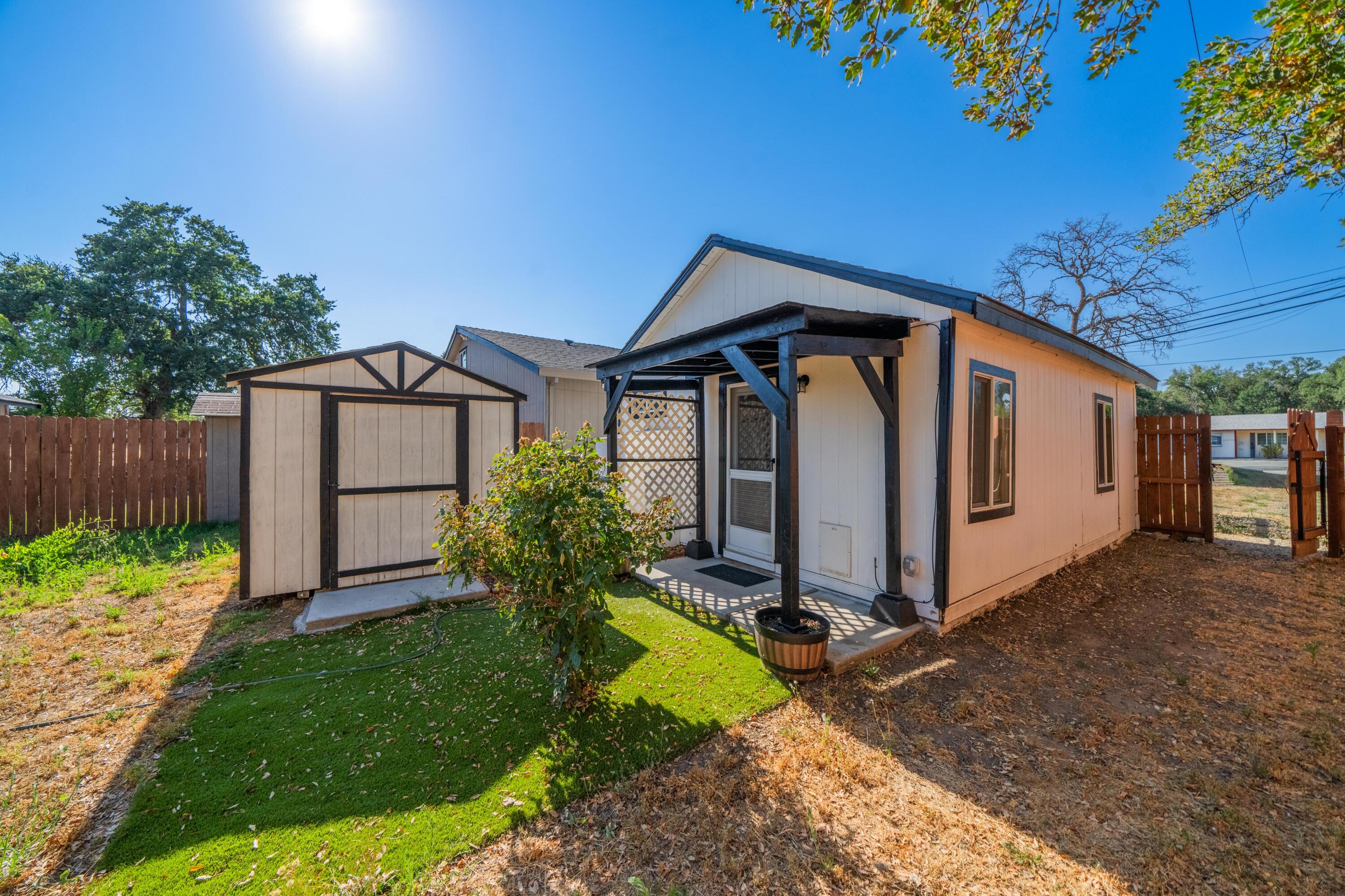 19825 Gas Point Road Cottonwood, CA 96022 - Photo 53 of 54 a front view of house with yard and green space
