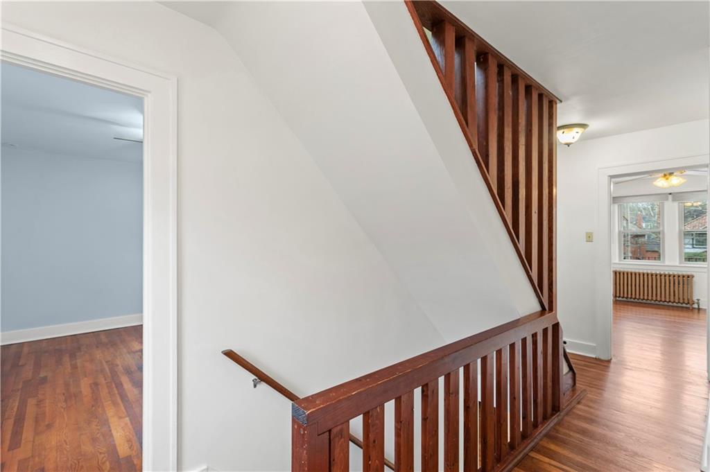 6953 Reynolds Street Pittsburgh, PA 15208 - Photo 27 of 50 a view of staircase with railing and white walls