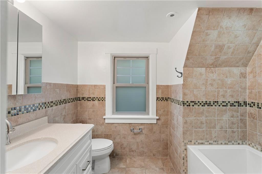 6953 Reynolds Street Pittsburgh, PA 15208 - Photo 40 of 50 a bathroom with a sink toilet and shower