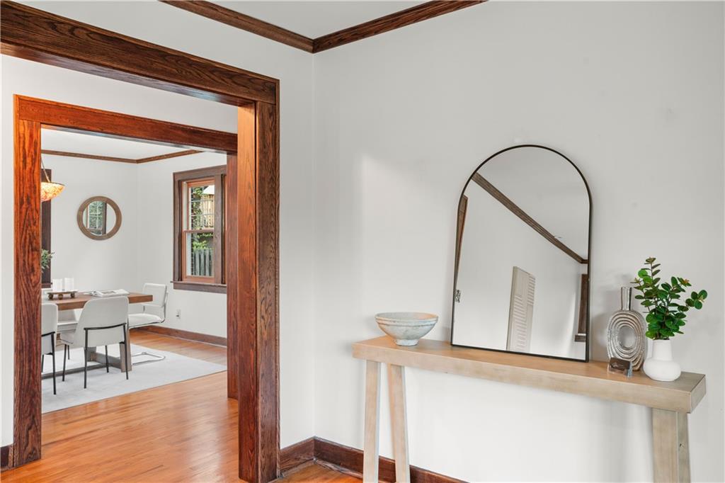 6953 Reynolds Street Pittsburgh, PA 15208 - Photo 9 of 50 a picture of a room with mirror and furniture