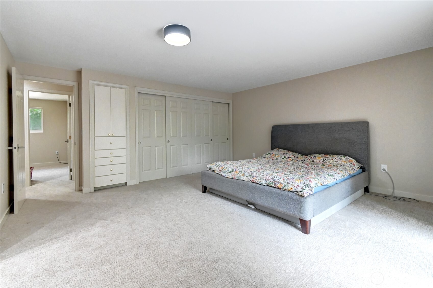 28539 Northeast Tolt Hill Road Carnation, WA 98014 - Photo 18 of 36 a bedroom with a bed and closet