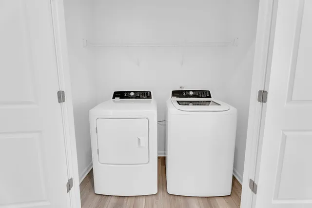 a utility room with dryer and washer