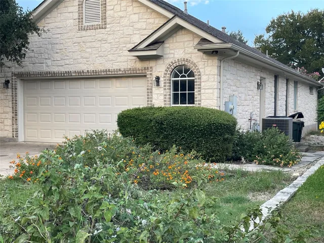 a house view with a outdoor space