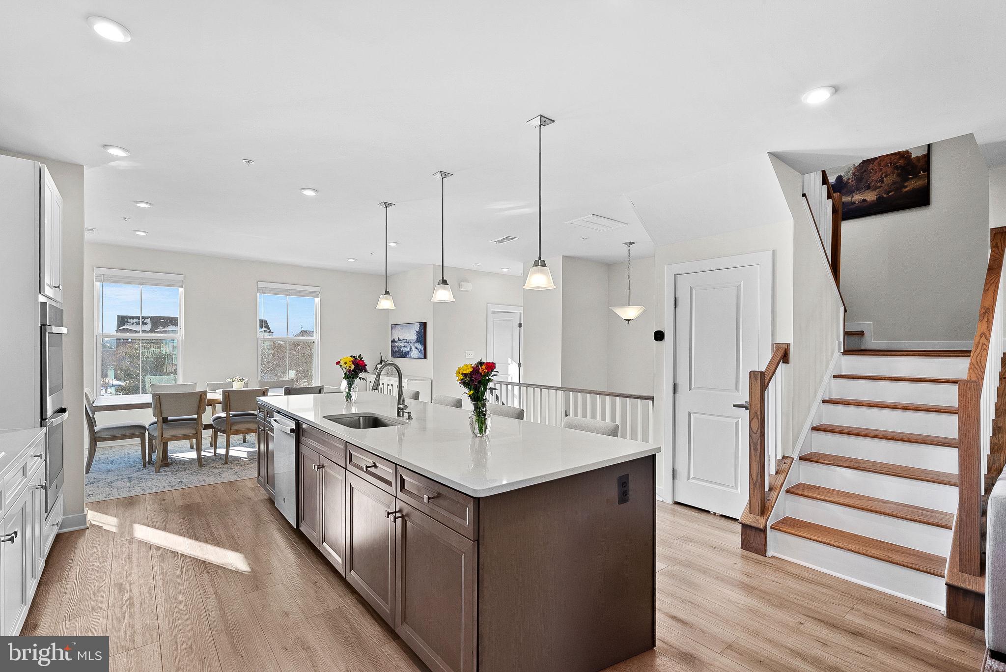 14522 George Carter Way Chantilly, VA 20151 - Photo 12 of 32 Wood Stairs to Main and Upper Levels