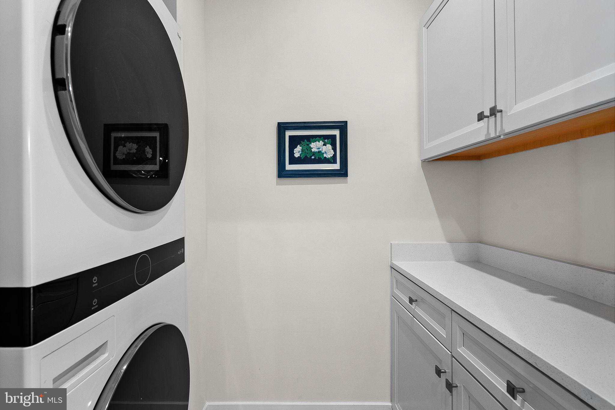 14522 George Carter Way Chantilly, VA 20151 - Photo 26 of 32 Upper Level Laundry Room w/Cabinets