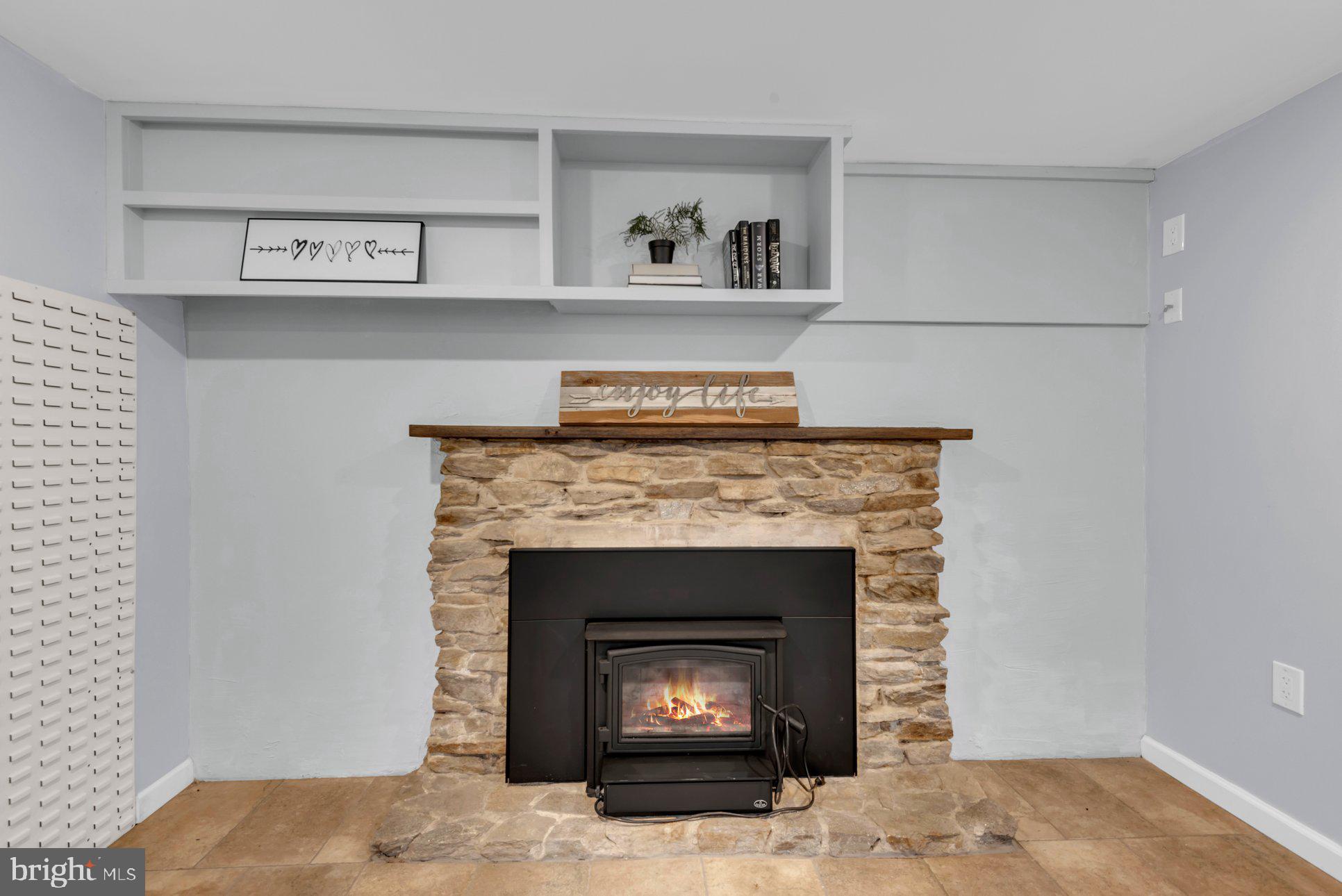 955 Hilltop Road Arnold, MD 21012 - Photo 32 of 56 Stone Fireplace w/Osborn Wood-Burning Stove