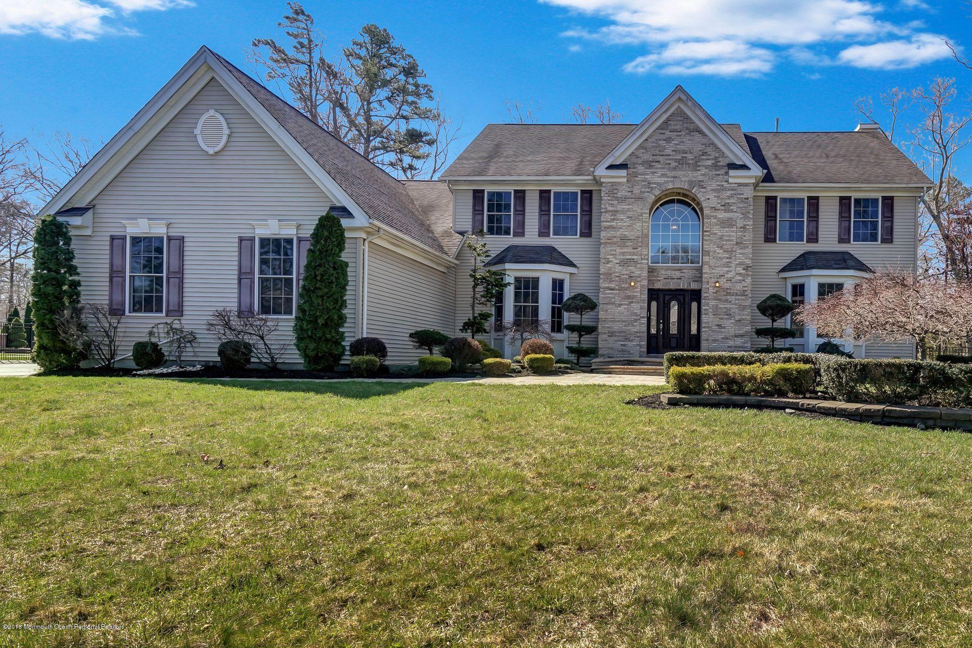 26 Conor Road Jackson, NJ 08527 - Photo 1 of 60 a front view of a house with swimming pool yard and outdoor seating