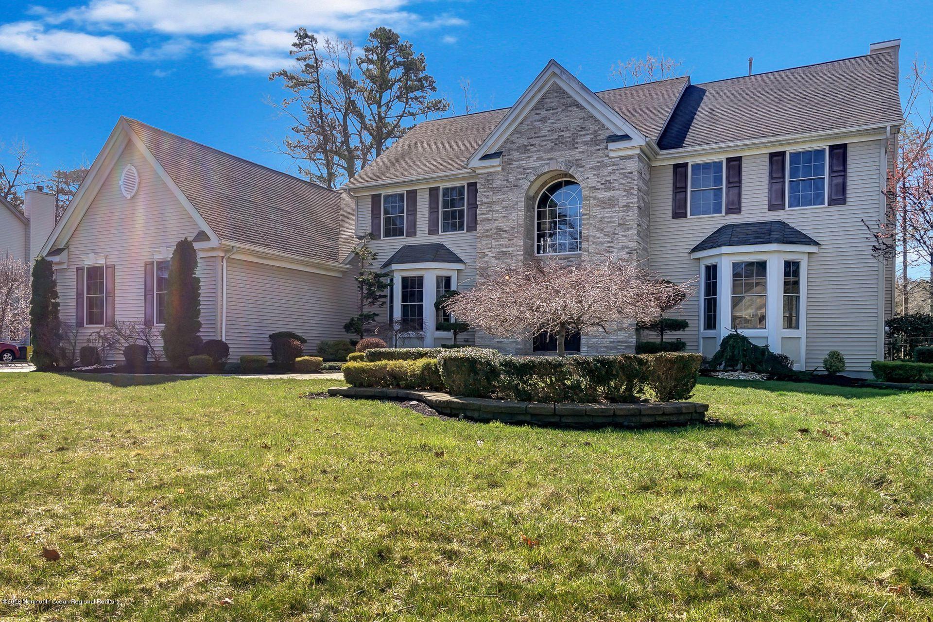 26 Conor Road Jackson, NJ 08527 - Photo 3 of 60 a front view of a house with a yard