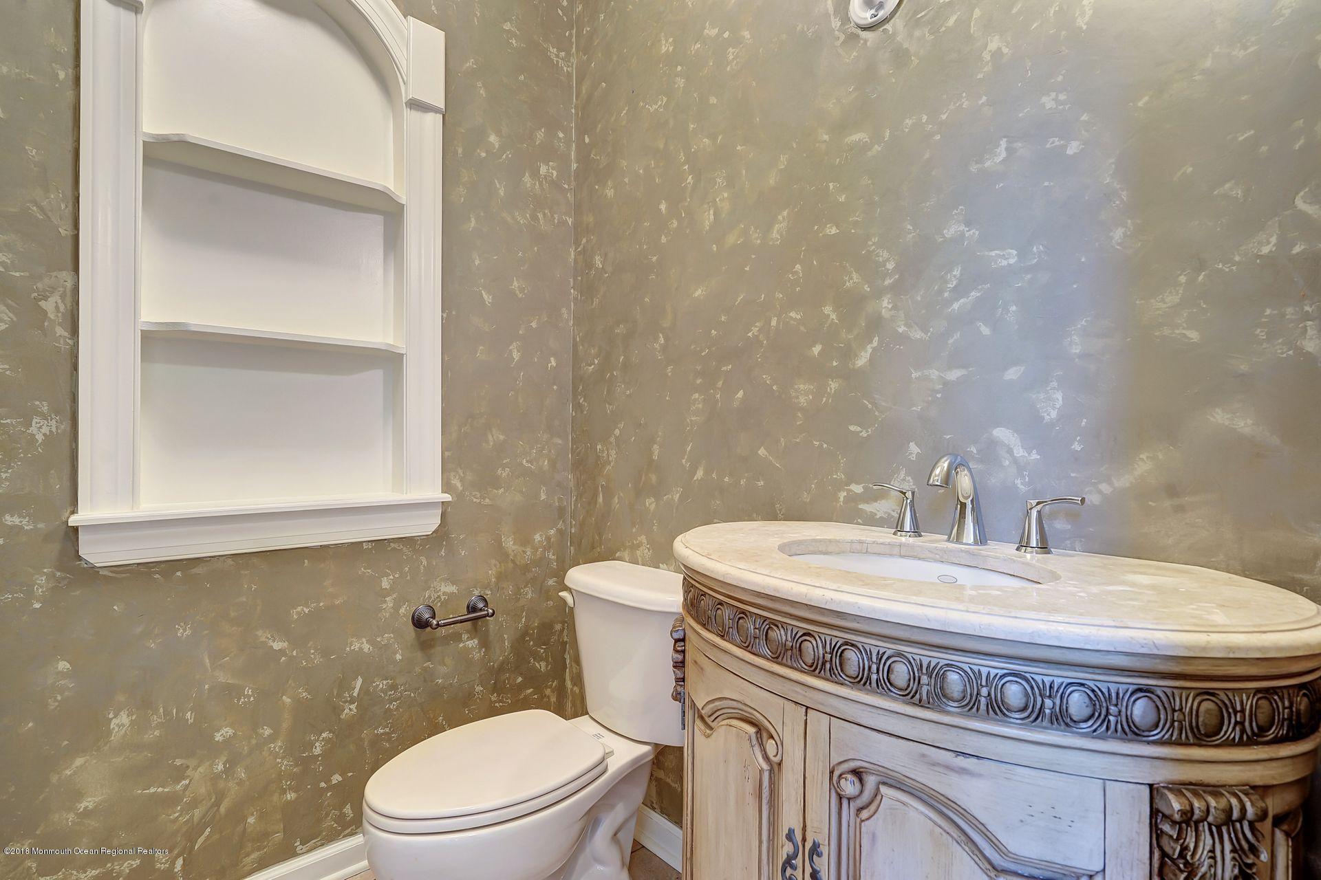 26 Conor Road Jackson, NJ 08527 - Photo 35 of 60 a bathroom with a toilet and a sink