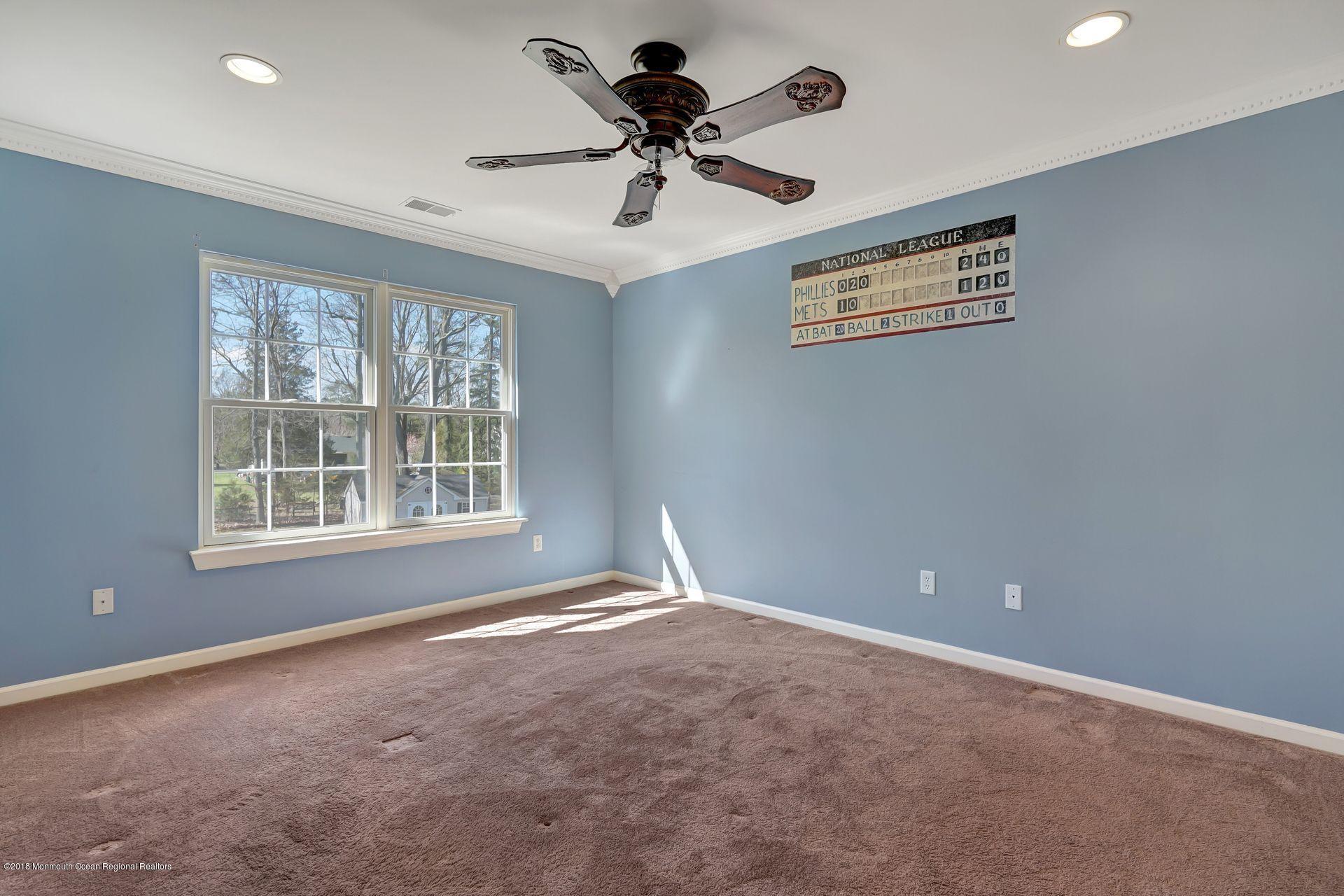 26 Conor Road Jackson, NJ 08527 - Photo 40 of 60 a view of an empty room with a window