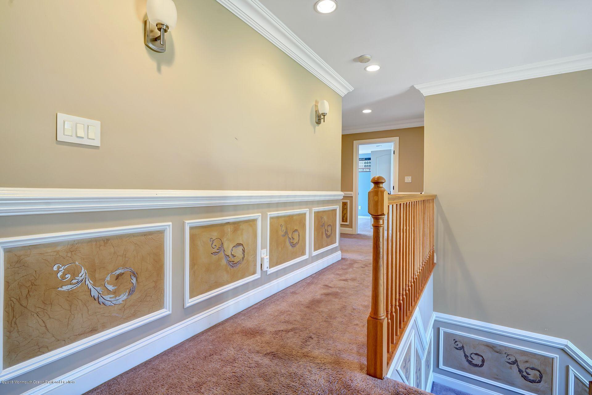 26 Conor Road Jackson, NJ 08527 - Photo 54 of 60 a view of a hallway with wooden floor