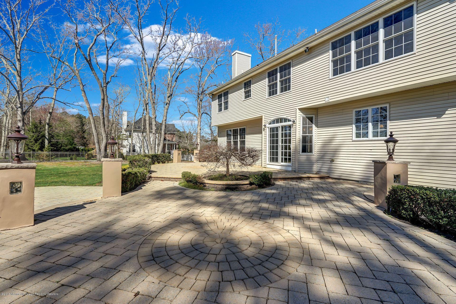 26 Conor Road Jackson, NJ 08527 - Photo 59 of 60 a view of a white house with a yard