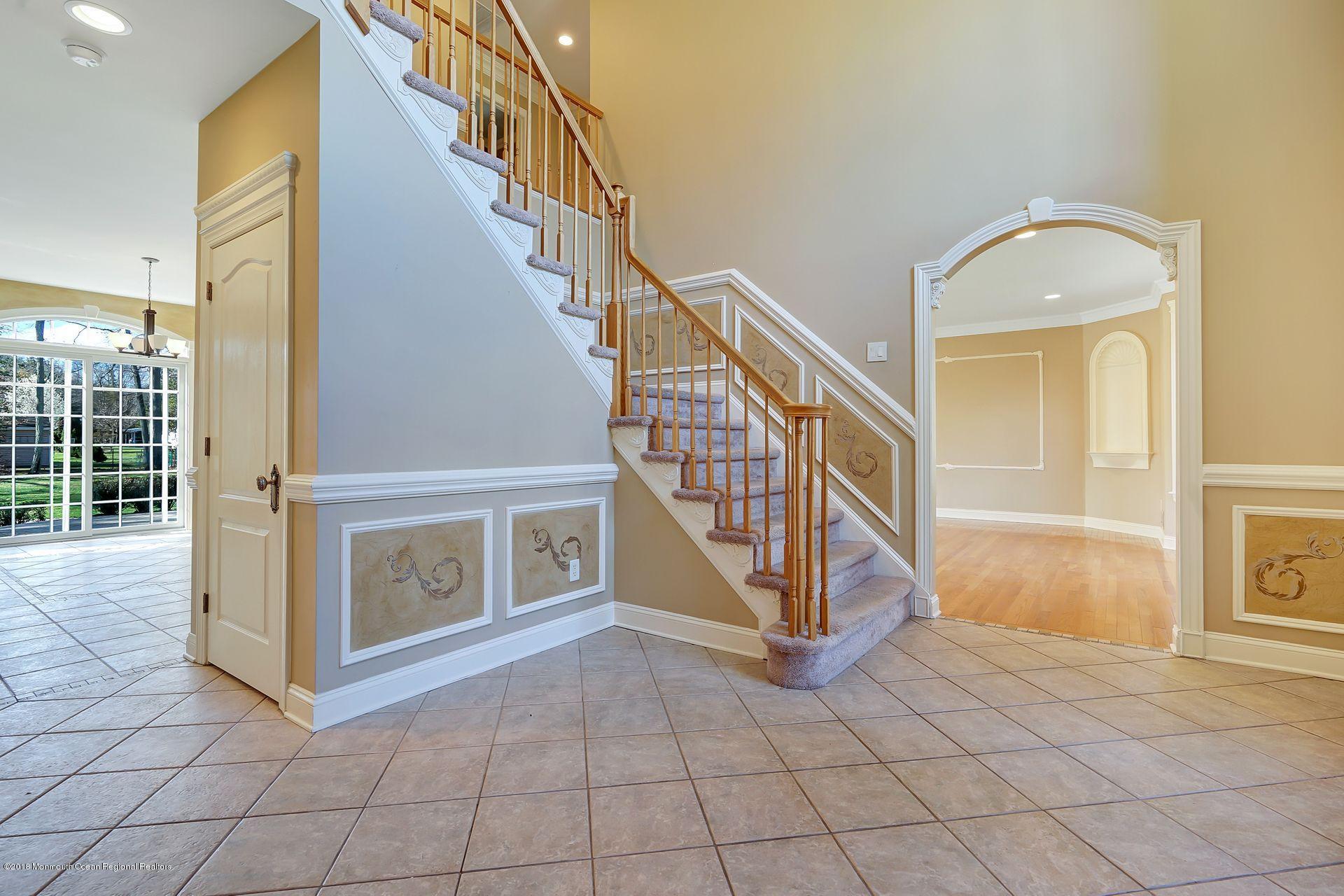 26 Conor Road Jackson, NJ 08527 - Photo 10 of 60 a view of an entryway with staircase