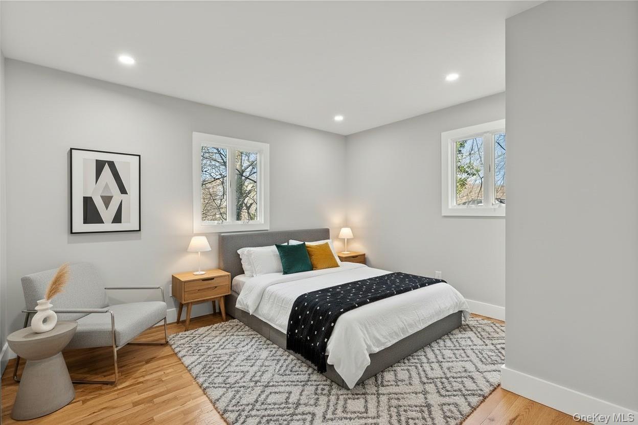 142 Crooked Hill Road Huntington Station, NY 11746 - Photo 10 of 18 Bedroom featuring light wood finished floors and recessed lighting