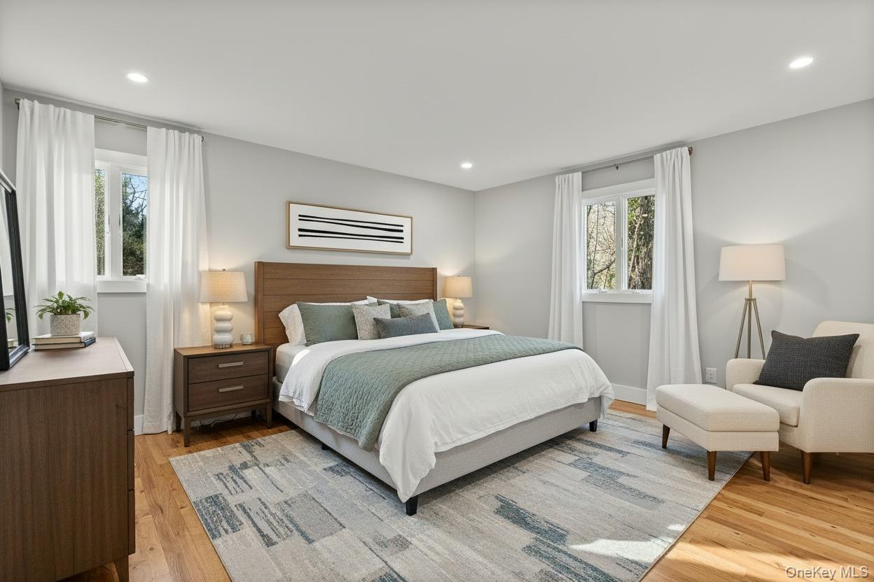 142 Crooked Hill Road Huntington Station, NY 11746 - Photo 11 of 18 Bedroom featuring light wood finished floors and recessed lighting