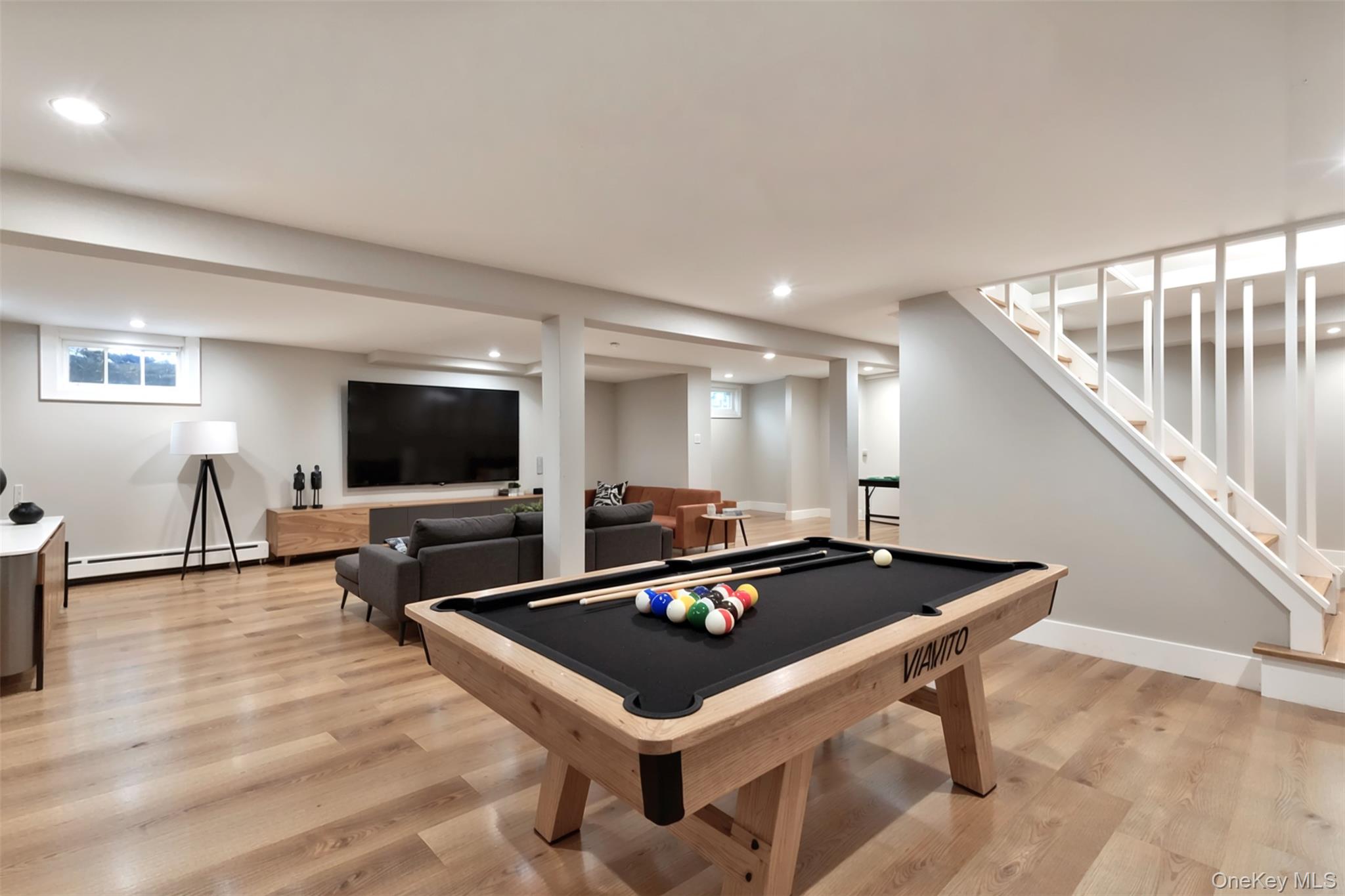 142 Crooked Hill Road Huntington Station, NY 11746 - Photo 15 of 18 Recreation room with light wood-style flooring, billiards, baseboard heating, and recessed lighting