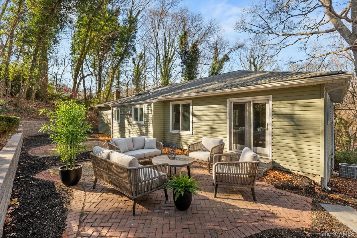 142 Crooked Hill Road Huntington Station, NY 11746 - Photo 16 of 18 View of patio / terrace featuring an outdoor living space