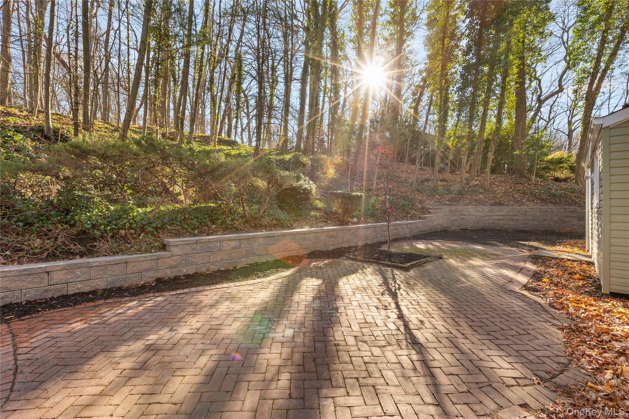 142 Crooked Hill Road Huntington Station, NY 11746 - Photo 17 of 18 Brick patio, new masonry retaining walls