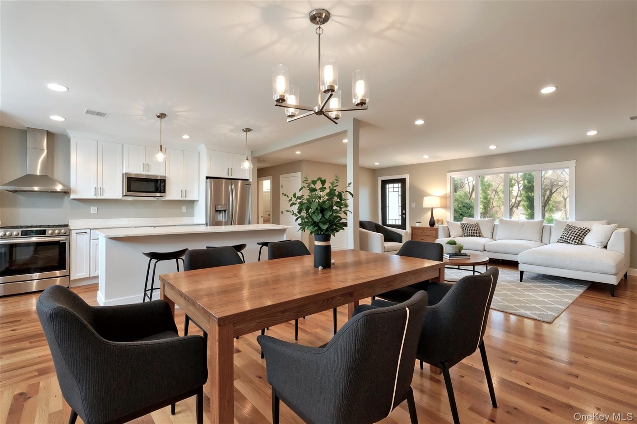 142 Crooked Hill Road Huntington Station, NY 11746 - Photo 3 of 18 Dining room featuring recessed lighting, light wood-type flooring, and a chandelier